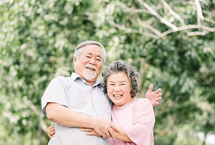 Happy couple hugs