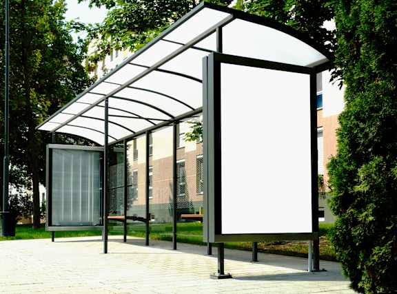 A blank billboard with a white background is mounted on a pole.