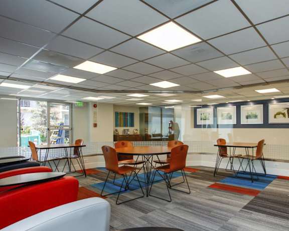 a conference room with a round table and chairs at 430 Kelton, Los Angeles, CA