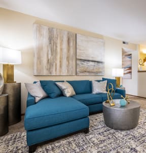 our apartments offer a living room with a blue couch