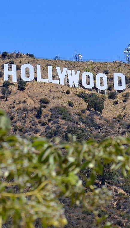 a view of the hollywood sign on a hill
