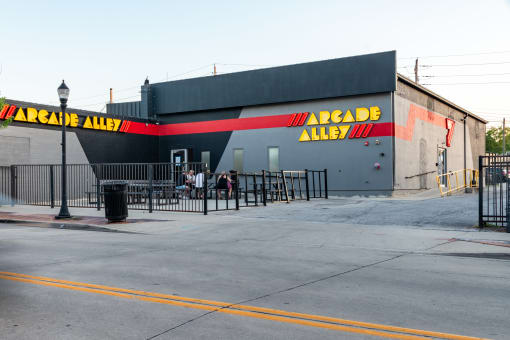 a building with a red and yellow sign that says race alley