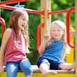 Two children in playground at Bella Vista Apartments, Phoenix, AZ 85009