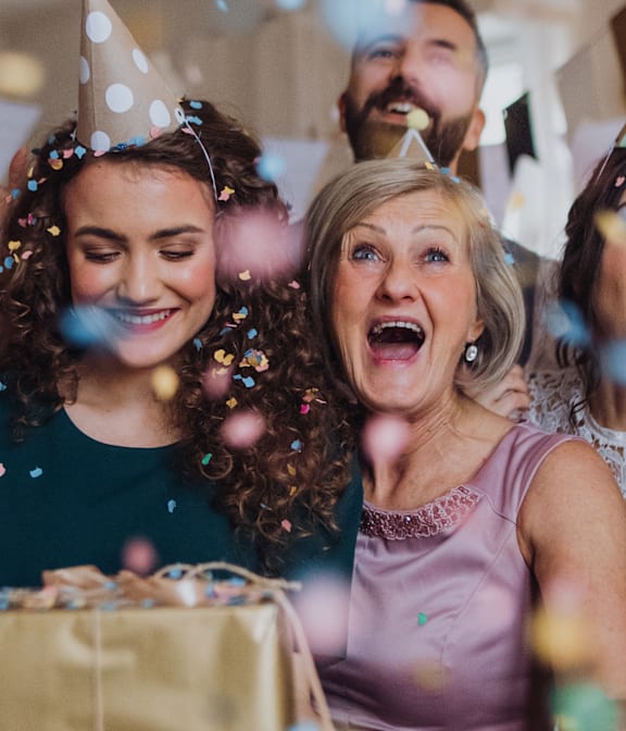 a group of people at a birthday party with birthday cake at Waldo Heights, Kansas City