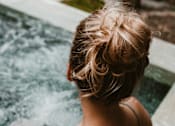 Thumbnail 14 of 20 - Woman with blonde hair is sitting in a pool of water at Brickside Heights, Millcreek, 84106