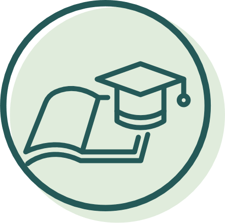 A graduation cap is placed on an open book.