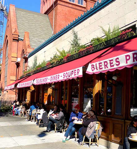 Paved alleyway with cafes near The Hudson Apartments, Washington, DC 20005