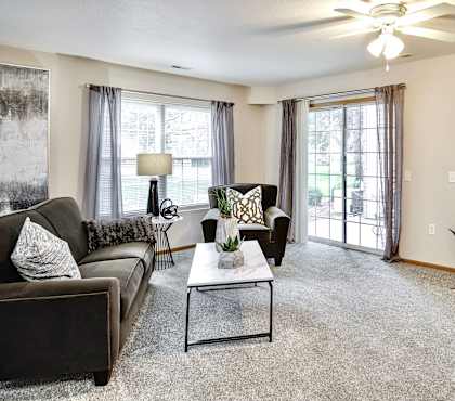 Living Room With TV And Fireplace at Tranquility Pointe, Omaha, NE