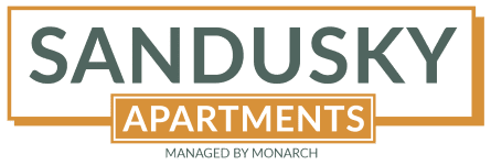 a sign that reads sandusky apartments with the word sandwich on it