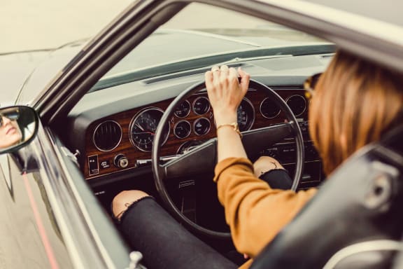 Woman Driving at Oceanwood Apartments, Lompoc, 93436