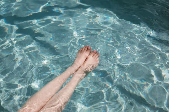 legs_dipping_swimming_pool_jacuzzi at Sumida Gardens Apartments, California, 93111