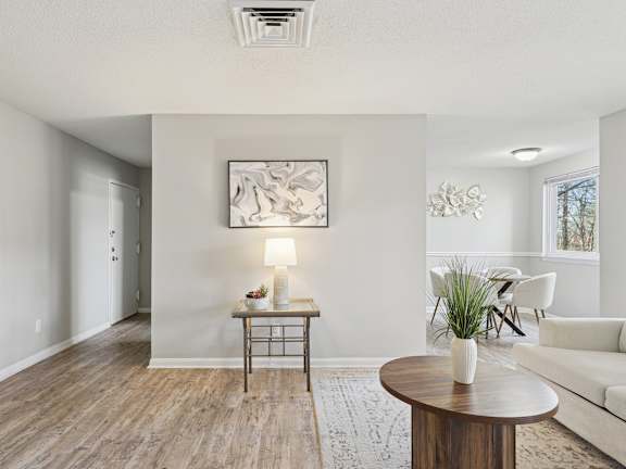 Group of people eating food at Casa de Luna Apartments, Raleigh, NC, 27604