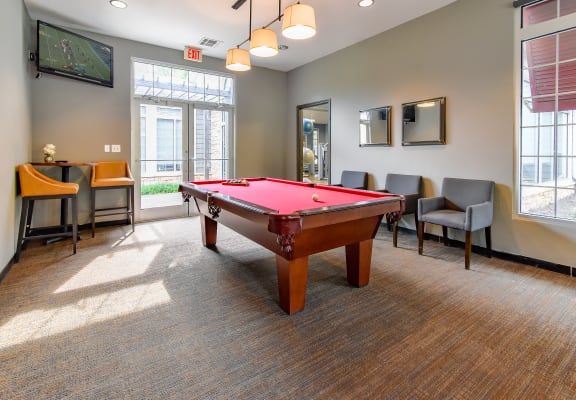 our apartments have a game room with a pool table and a flat screen tv at Riverset Apartments in Mud Island, Memphis, TN