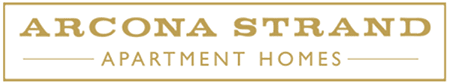 A sign that says Arcona Strand Apartment Homes.