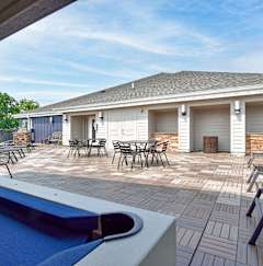 A pool table is in the foreground of this image.