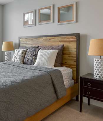 a bedroom with a bed and a large window at Park 205, Park Ridge, IL