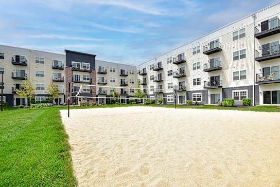 the preserve at ballantyne commons apartment community with sand court