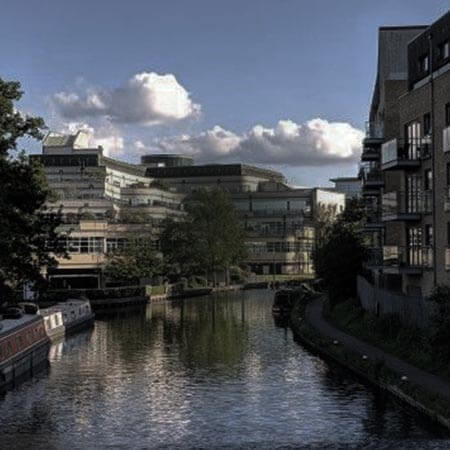 a river running through a city with buildings