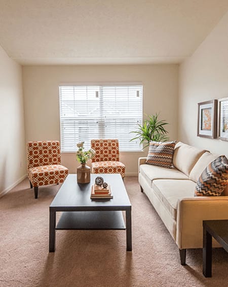 a living room with a couch and a coffee table