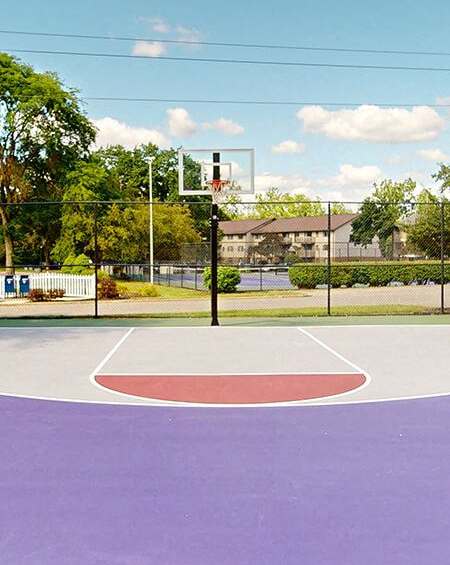 apartment complex with basketball court