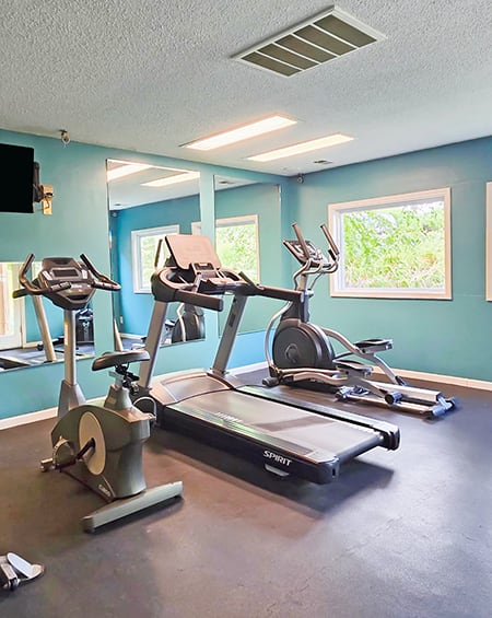 fitness center at apartment community