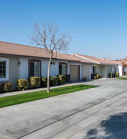 a street with houses on the side of a road