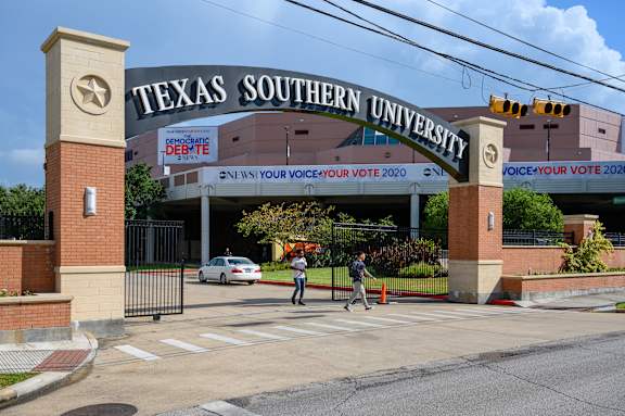 The entrance to Texas Southern University with a banner encouraging people to vote.