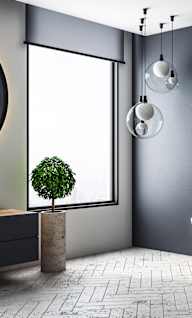 a bathroom with a white tub and a potted plant