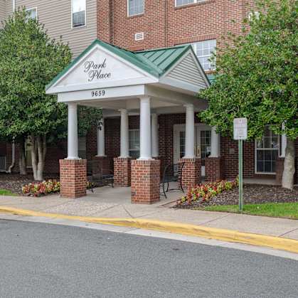 A building with a sign that says Park Place 9659.