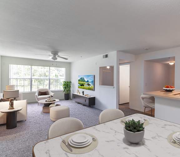 A modern kitchen with a dining table set for two.
