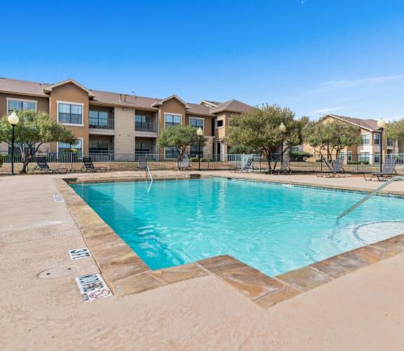the swimming pool at the preserve at polo ridge apartments