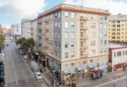 an overhead view of a large building on a city street