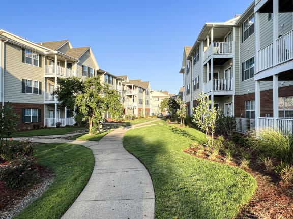 Property Sidewalk at The Madison Apartment Homes in Texas 75703