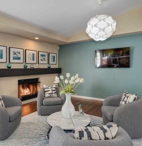 a billiards table in a hotel room with a blue pool table at Rocklin Manor  Apartments, Rocklin  , CA 95677
