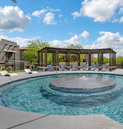 A pool with a blue line around it.