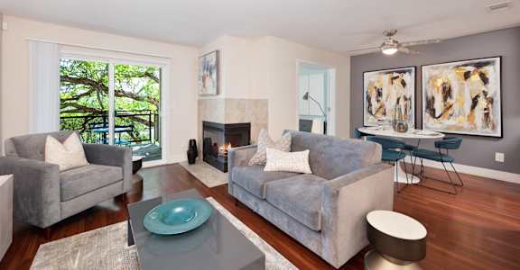 a living room with two couches and a coffee table and a fireplaceat Folsom Ranch, California, 95630