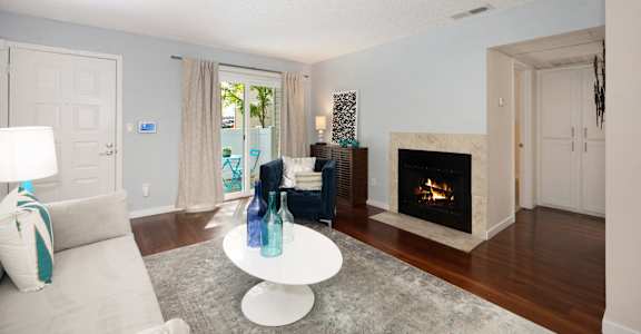 Spacious Living Room with Hardwood Flooring and Stylish Interior Showing Natural Light at Hidden Oaks Apartments, Citrus Heights, 95621