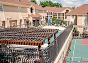 Thumbnail 10 of 17 - Resort-style pool with pergola seating at The Haven at Craigshire