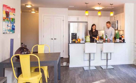 Open kitchen with breakfast bar at Linea Cambridge, Cambridge, MA