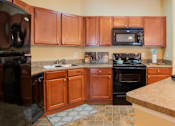 Thumbnail 22 of 40 - Birch Kitchen at Stone Ridge Apartment Homes, Alabama