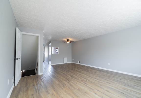Renovated Living Room with wooden floor at Willowbrooke Apartments, Brockport, New York, 14420