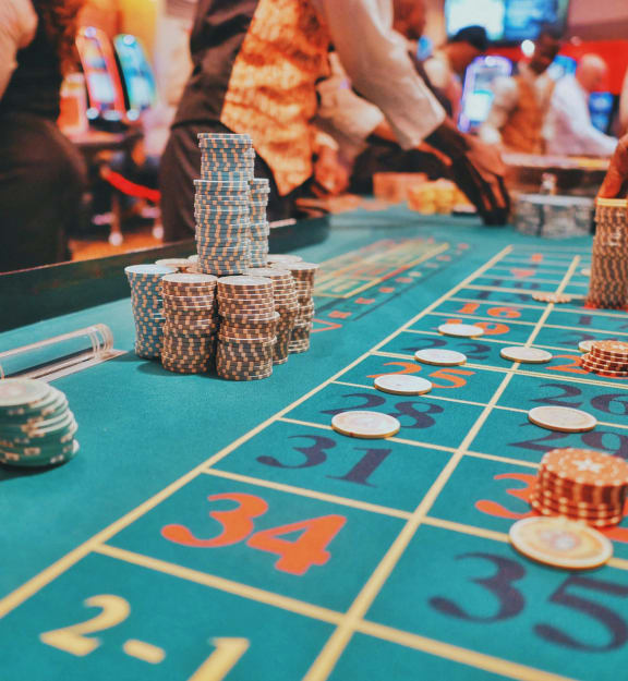 a casino table with gambling chips on it