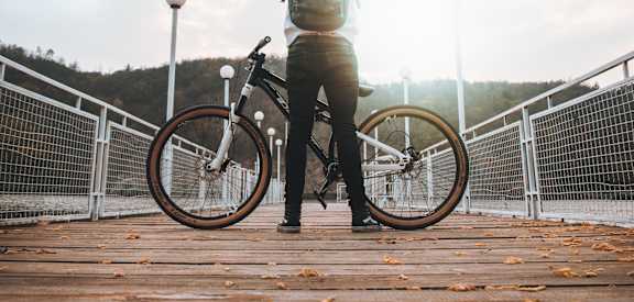 Man Riding Bicycle at Axcess 15 Apartments, Portland OR