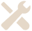 A white wrench and screwdriver crossed over each other.