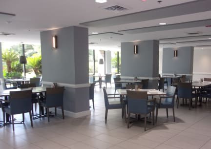 Large Dining Room with Tables at Hampton Apartments in Clearwater, FL 33759