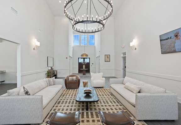 a living room with two couches and a coffee table