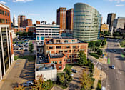 Thumbnail 14 of 14 - 100 south exterior drone show parking at 100 South Apartments, Buffalo, NY