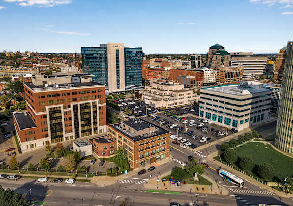 A cityscape at dusk at The Granite Works Apartments , Buffalo