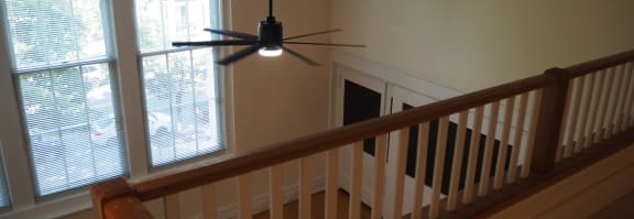 a view of the stairway from the bottom of the stairs
