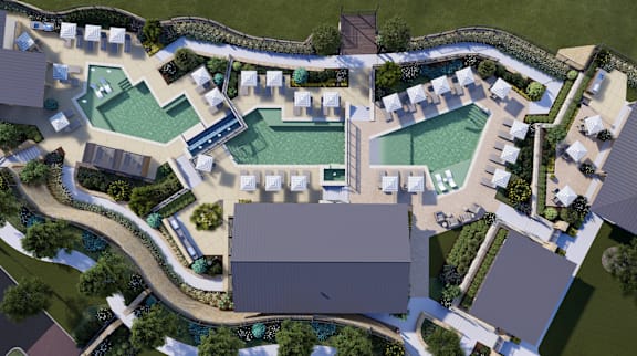 an aerial view of a resort with pools and a swimming pool